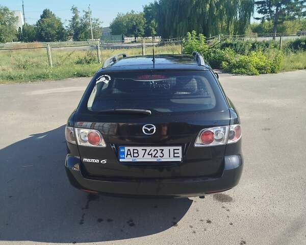 Черный Мазда 6, объемом двигателя 2 л и пробегом 300 тыс. км за 4300 $, фото 3 на Automoto.ua