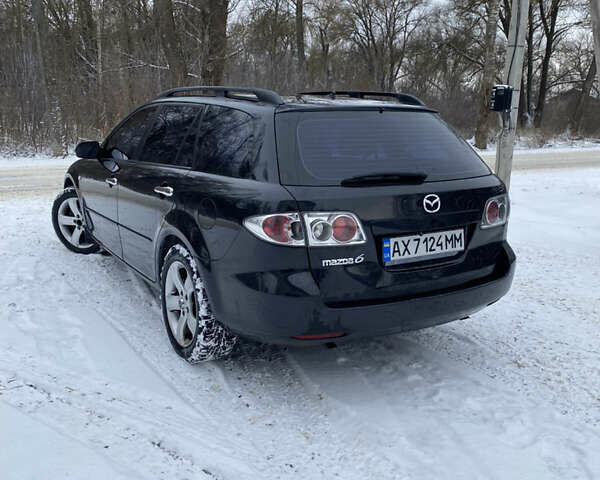 Чорний Мазда 6, об'ємом двигуна 2.3 л та пробігом 290 тис. км за 4500 $, фото 3 на Automoto.ua