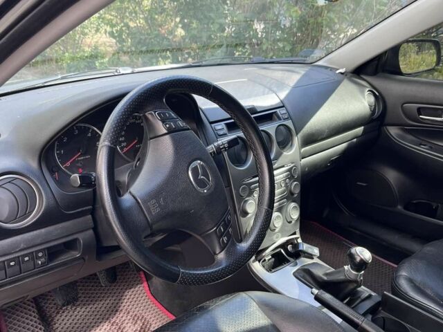 Черный Мазда 6, объемом двигателя 2 л и пробегом 297 тыс. км за 3300 $, фото 3 на Automoto.ua