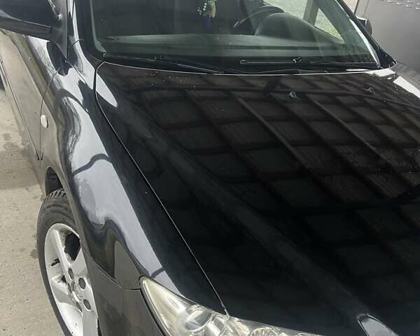 Черный Мазда 6, объемом двигателя 1.8 л и пробегом 173 тыс. км за 4200 $, фото 2 на Automoto.ua