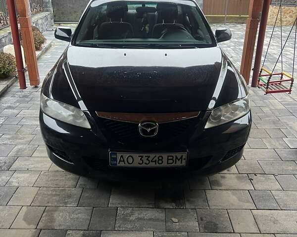 Черный Мазда 6, объемом двигателя 1.8 л и пробегом 173 тыс. км за 4200 $, фото 1 на Automoto.ua