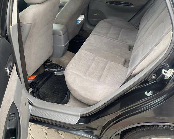 Черный Мазда 6, объемом двигателя 2 л и пробегом 370 тыс. км за 3300 $, фото 6 на Automoto.ua