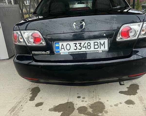 Черный Мазда 6, объемом двигателя 1.8 л и пробегом 173 тыс. км за 4200 $, фото 6 на Automoto.ua