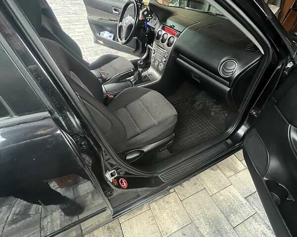 Черный Мазда 6, объемом двигателя 1.8 л и пробегом 173 тыс. км за 4200 $, фото 11 на Automoto.ua