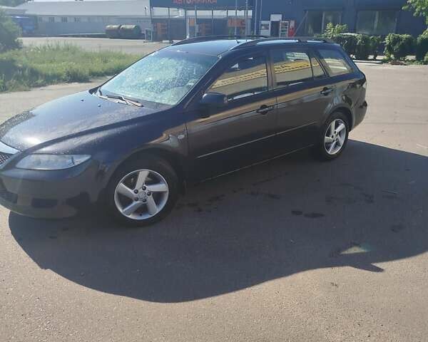 Черный Мазда 6, объемом двигателя 2 л и пробегом 300 тыс. км за 4300 $, фото 1 на Automoto.ua