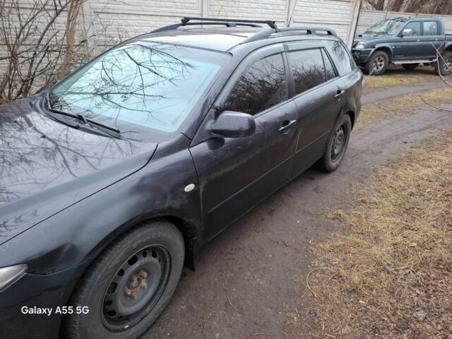 Черный Мазда 6, объемом двигателя 2 л и пробегом 362 тыс. км за 2601 $, фото 3 на Automoto.ua