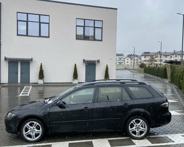 Чорний Мазда 6, об'ємом двигуна 2 л та пробігом 250 тис. км за 2000 $, фото 9 на Automoto.ua