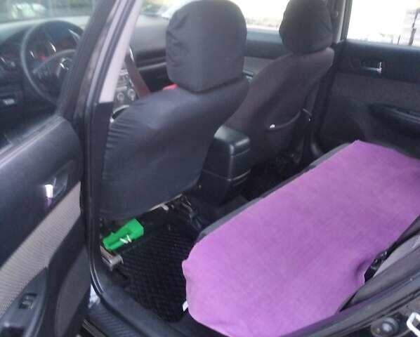 Черный Мазда 6, объемом двигателя 2 л и пробегом 250 тыс. км за 3800 $, фото 9 на Automoto.ua