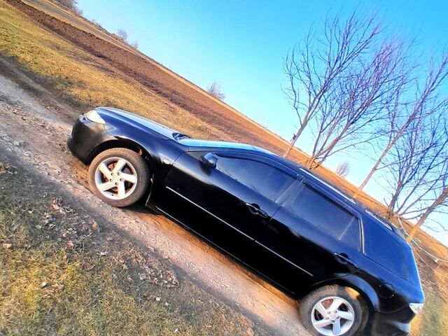 Черный Мазда 6, объемом двигателя 2 л и пробегом 293 тыс. км за 3800 $, фото 8 на Automoto.ua