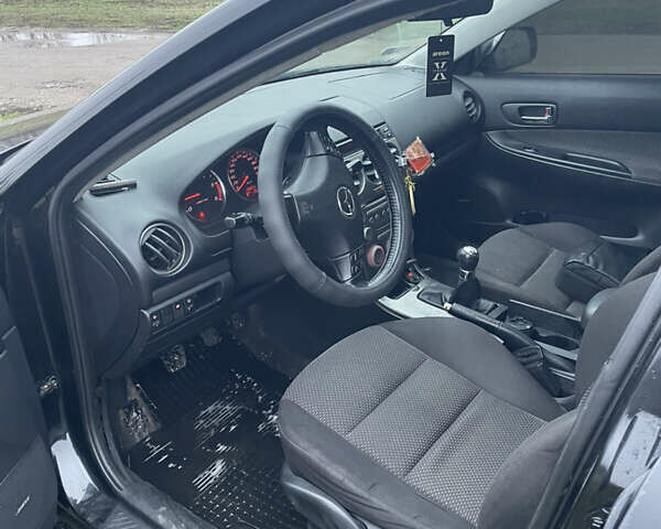 Черный Мазда 6, объемом двигателя 2 л и пробегом 280 тыс. км за 4500 $, фото 10 на Automoto.ua