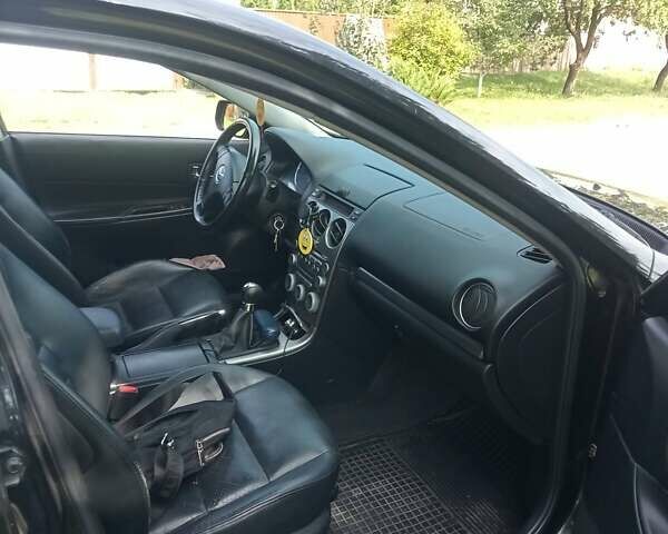 Черный Мазда 6, объемом двигателя 2 л и пробегом 260 тыс. км за 4000 $, фото 6 на Automoto.ua