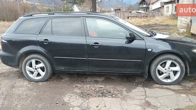 Черный Мазда 6, объемом двигателя 2 л и пробегом 352 тыс. км за 2700 $, фото 1 на Automoto.ua