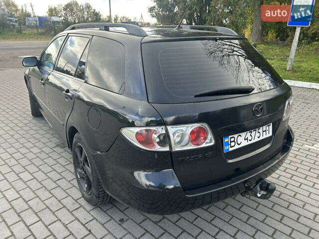Чорний Мазда 6, об'ємом двигуна 2 л та пробігом 250 тис. км за 2100 $, фото 4 на Automoto.ua