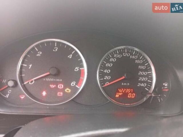Чорний Мазда 6, об'ємом двигуна 2 л та пробігом 422 тис. км за 2908 $, фото 4 на Automoto.ua
