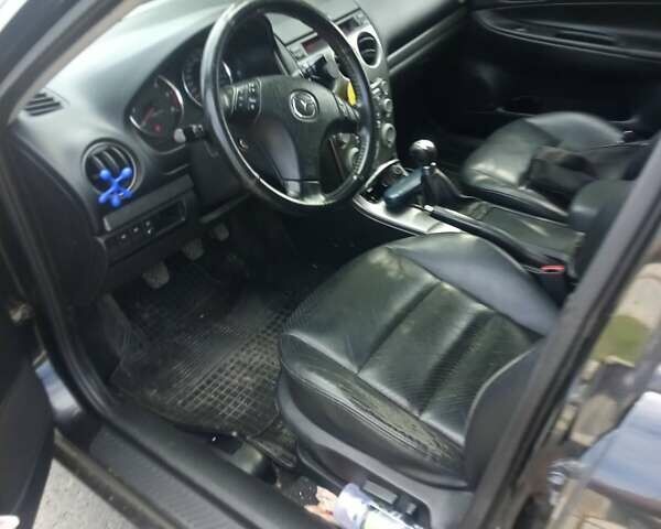 Черный Мазда 6, объемом двигателя 2 л и пробегом 260 тыс. км за 4000 $, фото 9 на Automoto.ua
