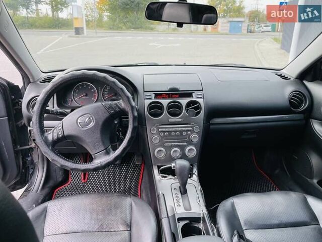 Чорний Мазда 6, об'ємом двигуна 2 л та пробігом 325 тис. км за 5500 $, фото 5 на Automoto.ua