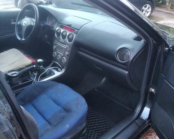 Черный Мазда 6, объемом двигателя 2 л и пробегом 250 тыс. км за 3800 $, фото 8 на Automoto.ua