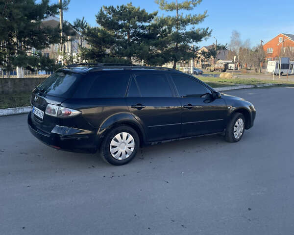 Черный Мазда 6, объемом двигателя 2 л и пробегом 280 тыс. км за 4500 $, фото 4 на Automoto.ua