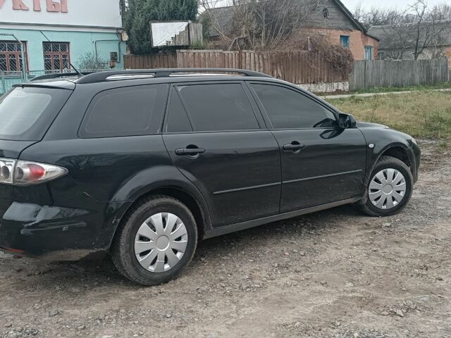 Чорний Мазда 6, об'ємом двигуна 2 л та пробігом 320 тис. км за 3600 $, фото 4 на Automoto.ua