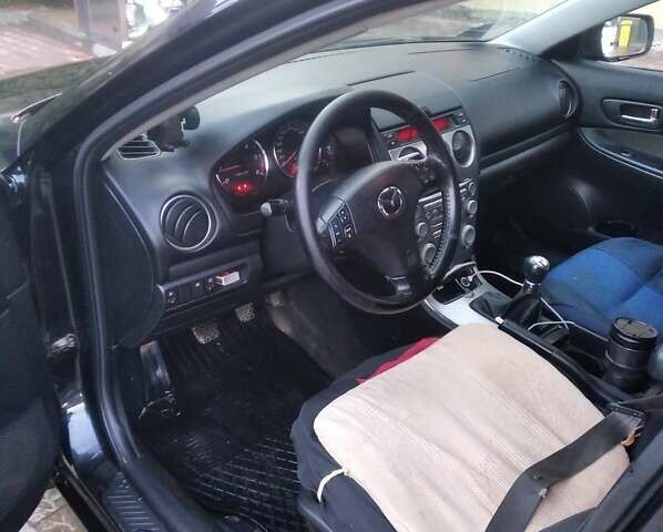 Черный Мазда 6, объемом двигателя 2 л и пробегом 250 тыс. км за 3800 $, фото 10 на Automoto.ua