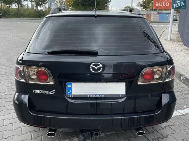 Чорний Мазда 6, об'ємом двигуна 2 л та пробігом 325 тис. км за 5500 $, фото 2 на Automoto.ua