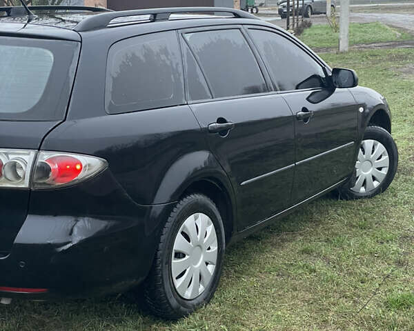 Черный Мазда 6, объемом двигателя 2 л и пробегом 280 тыс. км за 4500 $, фото 14 на Automoto.ua