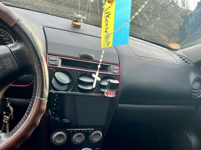 Черный Мазда 6, объемом двигателя 2 л и пробегом 293 тыс. км за 3800 $, фото 7 на Automoto.ua