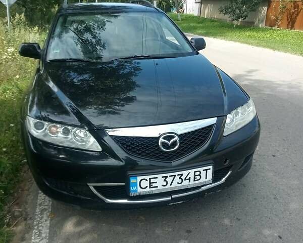 Черный Мазда 6, объемом двигателя 2 л и пробегом 260 тыс. км за 4000 $, фото 1 на Automoto.ua