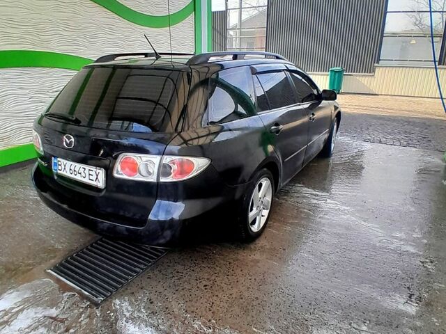 Черный Мазда 6, объемом двигателя 2 л и пробегом 293 тыс. км за 3800 $, фото 4 на Automoto.ua
