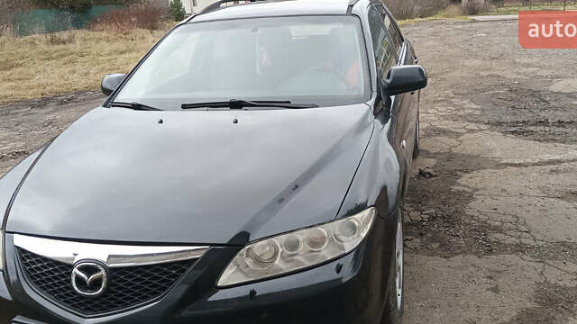 Черный Мазда 6, объемом двигателя 2 л и пробегом 352 тыс. км за 2700 $, фото 2 на Automoto.ua