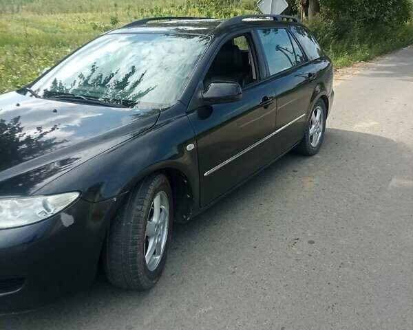 Черный Мазда 6, объемом двигателя 2 л и пробегом 260 тыс. км за 4000 $, фото 2 на Automoto.ua