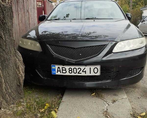 Черный Мазда 6, объемом двигателя 1.8 л и пробегом 206 тыс. км за 2999 $, фото 1 на Automoto.ua