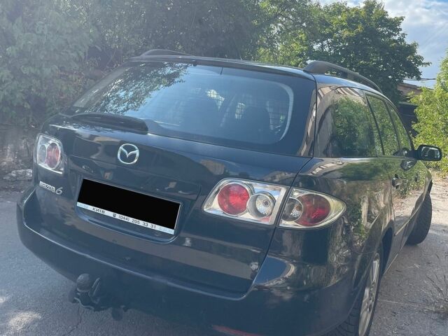 Чорний Мазда 6, об'ємом двигуна 2 л та пробігом 304 тис. км за 2750 $, фото 4 на Automoto.ua