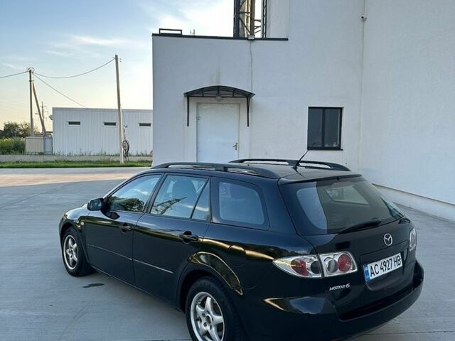 Черный Мазда 6, объемом двигателя 2 л и пробегом 312 тыс. км за 2999 $, фото 3 на Automoto.ua