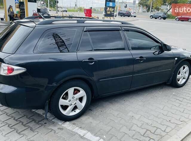 Чорний Мазда 6, об'ємом двигуна 2 л та пробігом 325 тис. км за 5500 $, фото 3 на Automoto.ua