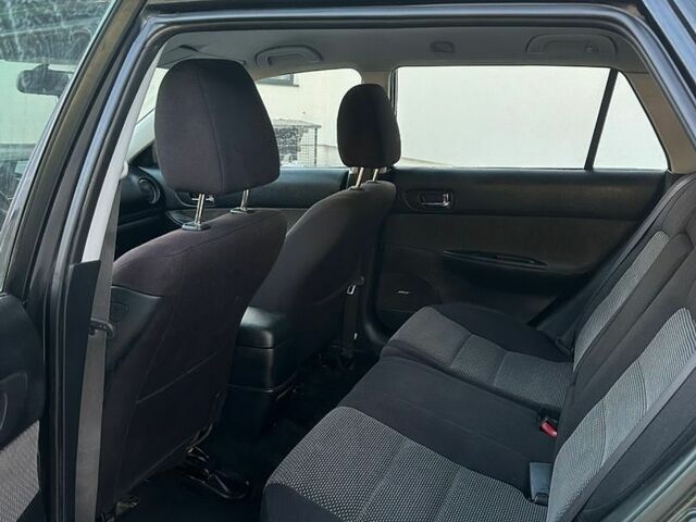 Черный Мазда 6, объемом двигателя 2 л и пробегом 312 тыс. км за 2999 $, фото 6 на Automoto.ua
