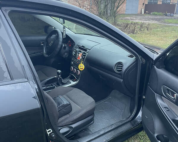 Черный Мазда 6, объемом двигателя 2 л и пробегом 280 тыс. км за 4500 $, фото 9 на Automoto.ua