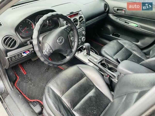 Чорний Мазда 6, об'ємом двигуна 2 л та пробігом 325 тис. км за 5500 $, фото 6 на Automoto.ua