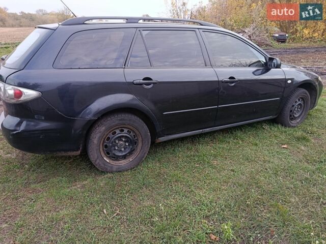 Чорний Мазда 6, об'ємом двигуна 2 л та пробігом 234 тис. км за 3300 $, фото 2 на Automoto.ua