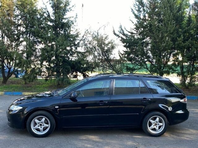 Чорний Мазда 6, об'ємом двигуна 2 л та пробігом 312 тис. км за 2999 $, фото 4 на Automoto.ua