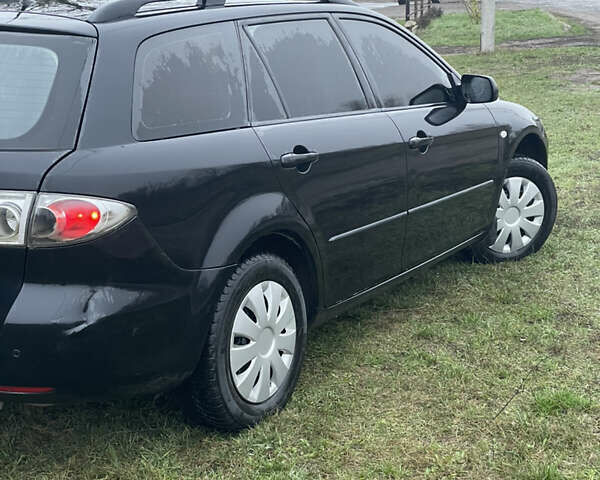 Черный Мазда 6, объемом двигателя 2 л и пробегом 280 тыс. км за 4500 $, фото 12 на Automoto.ua