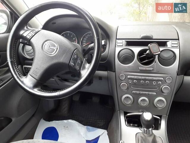 Черный Мазда 6, объемом двигателя 1.8 л и пробегом 206 тыс. км за 2999 $, фото 7 на Automoto.ua