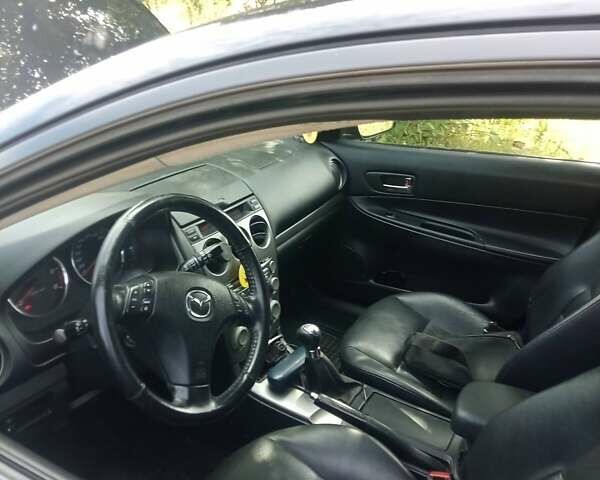 Черный Мазда 6, объемом двигателя 2 л и пробегом 260 тыс. км за 4000 $, фото 7 на Automoto.ua