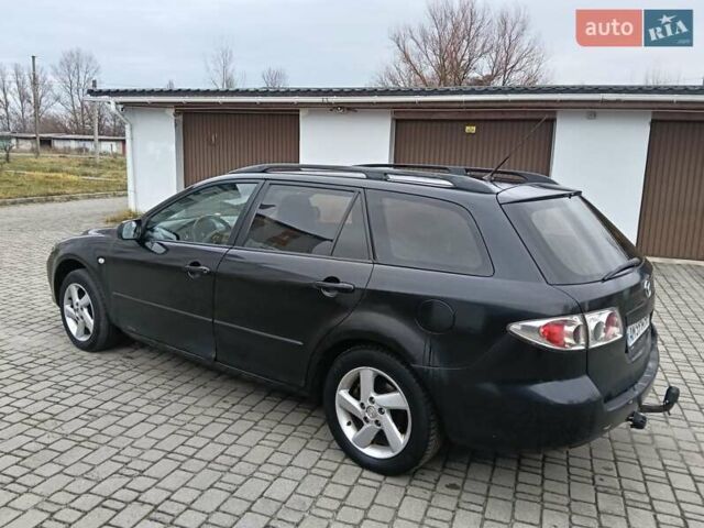 Чорний Мазда 6, об'ємом двигуна 2 л та пробігом 250 тис. км за 1950 $, фото 4 на Automoto.ua