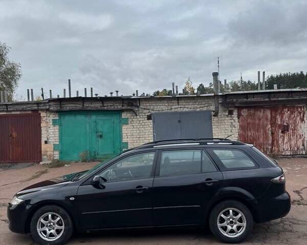 Черный Мазда 6, объемом двигателя 2 л и пробегом 309 тыс. км за 3700 $, фото 5 на Automoto.ua