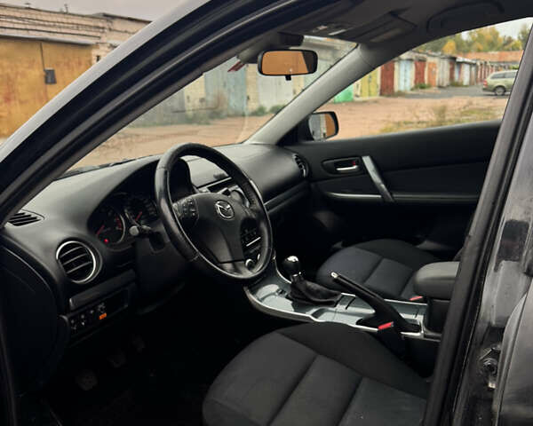Черный Мазда 6, объемом двигателя 2 л и пробегом 309 тыс. км за 3700 $, фото 6 на Automoto.ua
