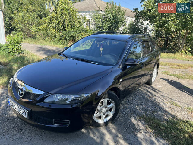 Черный Мазда 6, объемом двигателя 2 л и пробегом 220 тыс. км за 4900 $, фото 1 на Automoto.ua