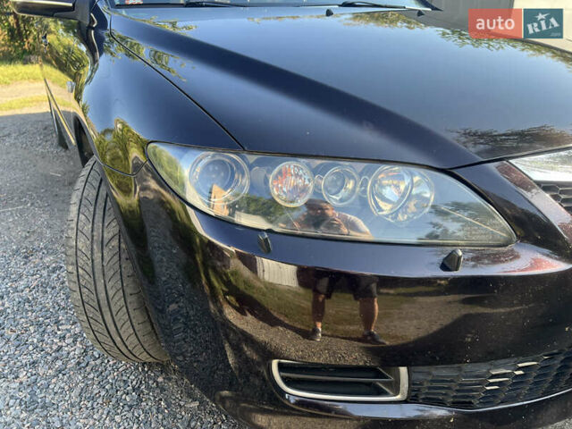 Черный Мазда 6, объемом двигателя 2 л и пробегом 220 тыс. км за 4900 $, фото 2 на Automoto.ua
