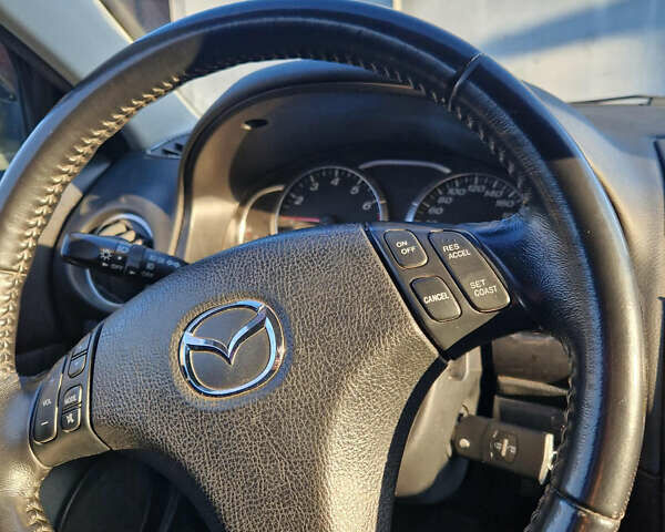 Черный Мазда 6, объемом двигателя 2 л и пробегом 220 тыс. км за 4900 $, фото 20 на Automoto.ua