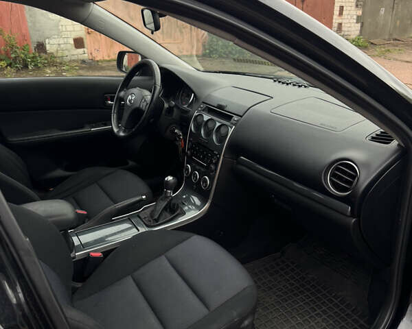 Черный Мазда 6, объемом двигателя 2 л и пробегом 309 тыс. км за 3700 $, фото 8 на Automoto.ua